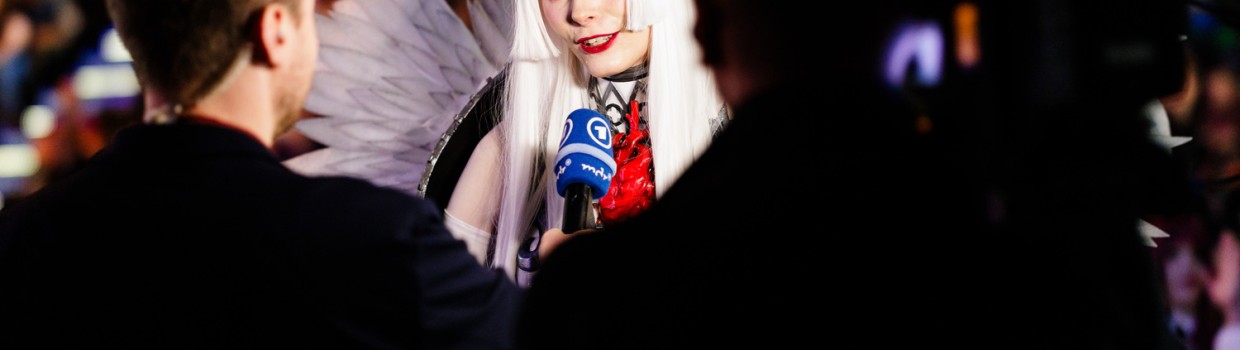 Cosplayer is being interviewed by a TV crew at the Manga-Comic-Con 2024
