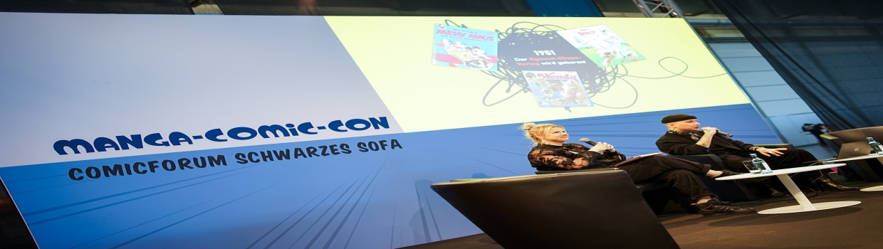 2 people on the stage of the 
Comic Forum “Black Sofa” at 
the Manga-Comic-Con 2025
