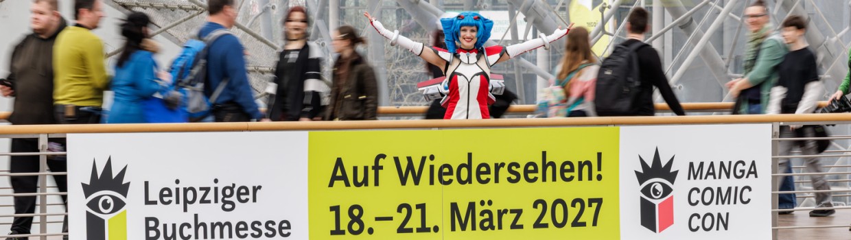 Macoco showing the banner "Auf Wiedersehen" at Manga Comic Con 2026